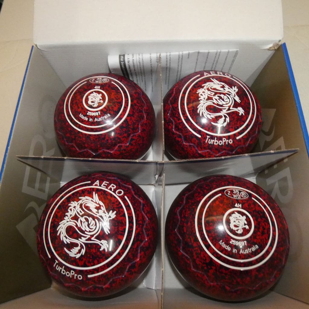 Set of four Aero Turbopro size 4H red lawn bowls in official packaging box
