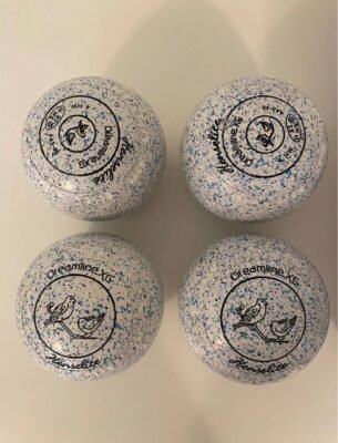 Four Henselite Dreamline XG Everest lawn bowls arranged in two rows